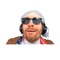 a man wearing sunglasses and headphones with an american flag around his neck