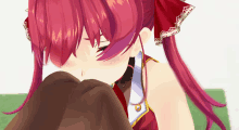 a close up of a girl with red hair