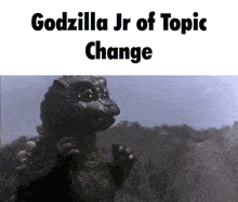a godzilla jr of topic change meme with a picture of a monster