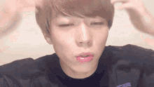 a close up of a person 's face with pink lipstick on