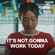 a woman looking at her phone with the words " it 's not gonna work today "
