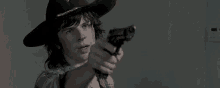 Carl Grimes Aim GIF - Carl Grimes Aim The Walking Dead GIFs