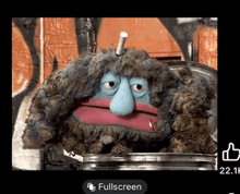 a picture of a stuffed animal with a cigarette sticking out of its mouth and a full screen button