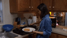 Parks And Rec April Ludgate GIF - Parks And Rec April Ludgate Making Grilled Cheese Sandwiches GIFs