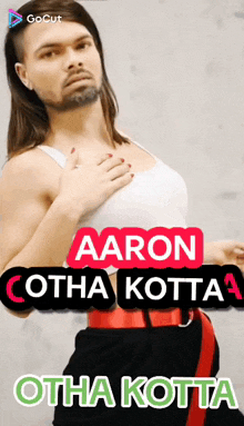 a man with long hair and a beard is wearing a white tank top and red belt