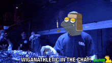 a cartoon of a man playing a dj set with the words wiganathletic in the chat