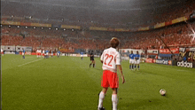 a soccer player with the number 22 on his back