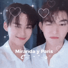 a couple of young men are standing next to each other with hearts on their faces .