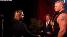 Brock Lesnar Seth Rollins GIF - Brock Lesnar Seth Rollins Youre In My Seat GIFs