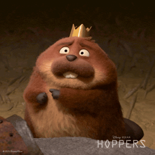 a cartoon beaver with a crown on his head is from disney pixar hoppers
