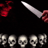 a person is holding a knife in front of a row of skulls and a neon sign that says dema