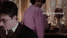 a harry potter scene with the words omg it worked in the corner