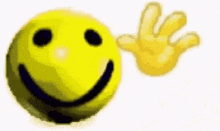 a yellow smiley face with a hand behind it is waving .