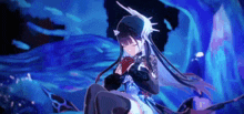 a girl with long black hair is sitting in a dark room
