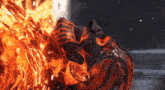 a person 's head is on fire with flames coming out of his mouth