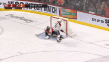 a hockey game between the montreal canadiens and the philadelphia flyers is underway