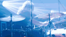 a drummer playing a set of zildjian cymbals