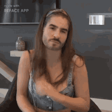 a woman with a beard and a headband is made with the reface app