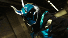 a close up of a person wearing a helmet and a costume