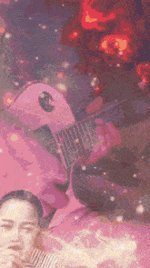 a woman smoking a cigarette in front of a guitar