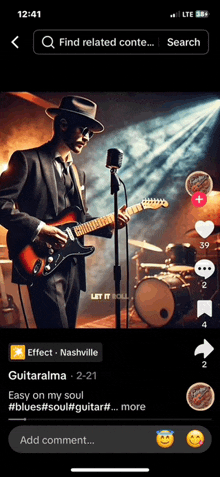 a man in a suit and hat is playing a guitar in front of a microphone