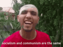 a man in a red shirt is laughing with the words socialism and communism are the same below him