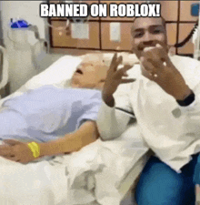 a man sitting next to an elderly woman in a hospital bed with the words banned on roblox on the bottom