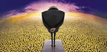 a man in a suit stands in front of a field of minions