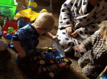 Presents Toddler GIF - Presents Toddler Toys GIFs