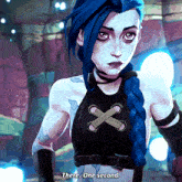 a woman with blue hair and a braided ponytail says there one second