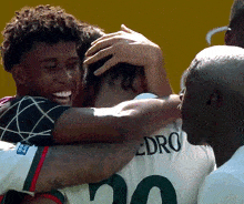 a soccer player with the number 20 on his back