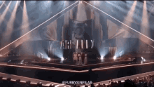 a group of people on a stage with the words we are worthy