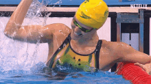 paralympics australian swimmer punching water splashing water rising phoenix