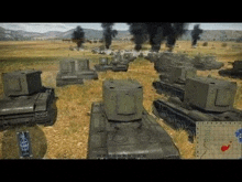 a large group of tanks are fighting in a field .