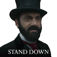 a man with a beard wearing a top hat says " stand down " on a white background