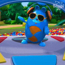 a cartoon character wearing sunglasses and headphones is dancing