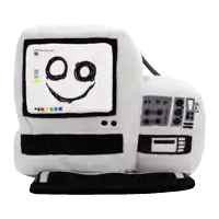 a stuffed computer with a smiley face drawn on it