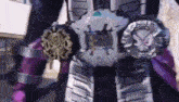 a close up of a person wearing a purple and silver robot costume with a watch on their belt .