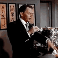 Drinking Frank Sinatra GIF - Drinking Frank Sinatra Jingle Bells GIFs