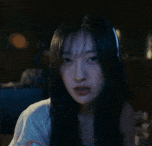 a close up of a woman wearing headphones