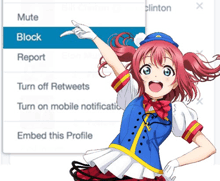 a girl in a blue and white outfit points to the block option