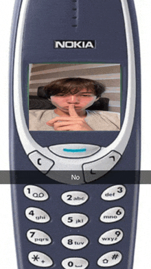 a nokia cell phone with a picture of a man on it