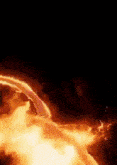 a close up of a fire explosion in the dark