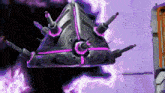 a purple and black object is flying in the air in a room .