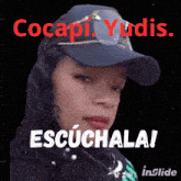 a woman wearing a hat with the words cocapi yudia escuchala on it