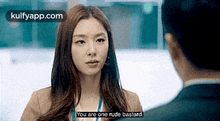 a woman is talking to a man and says `` you are one rude bastard . ''