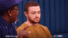 a man with a beard is on nbc 's celebrity chef show
