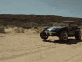 Singer-robbie-williams Desert GIF - Singer-robbie-williams Desert Dune-racing GIFs