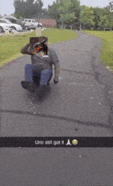 a snapchat of a man riding a skateboard with the caption " unc still got it " on it