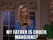 a woman standing in front of a door with the words my father is chuck mangione
